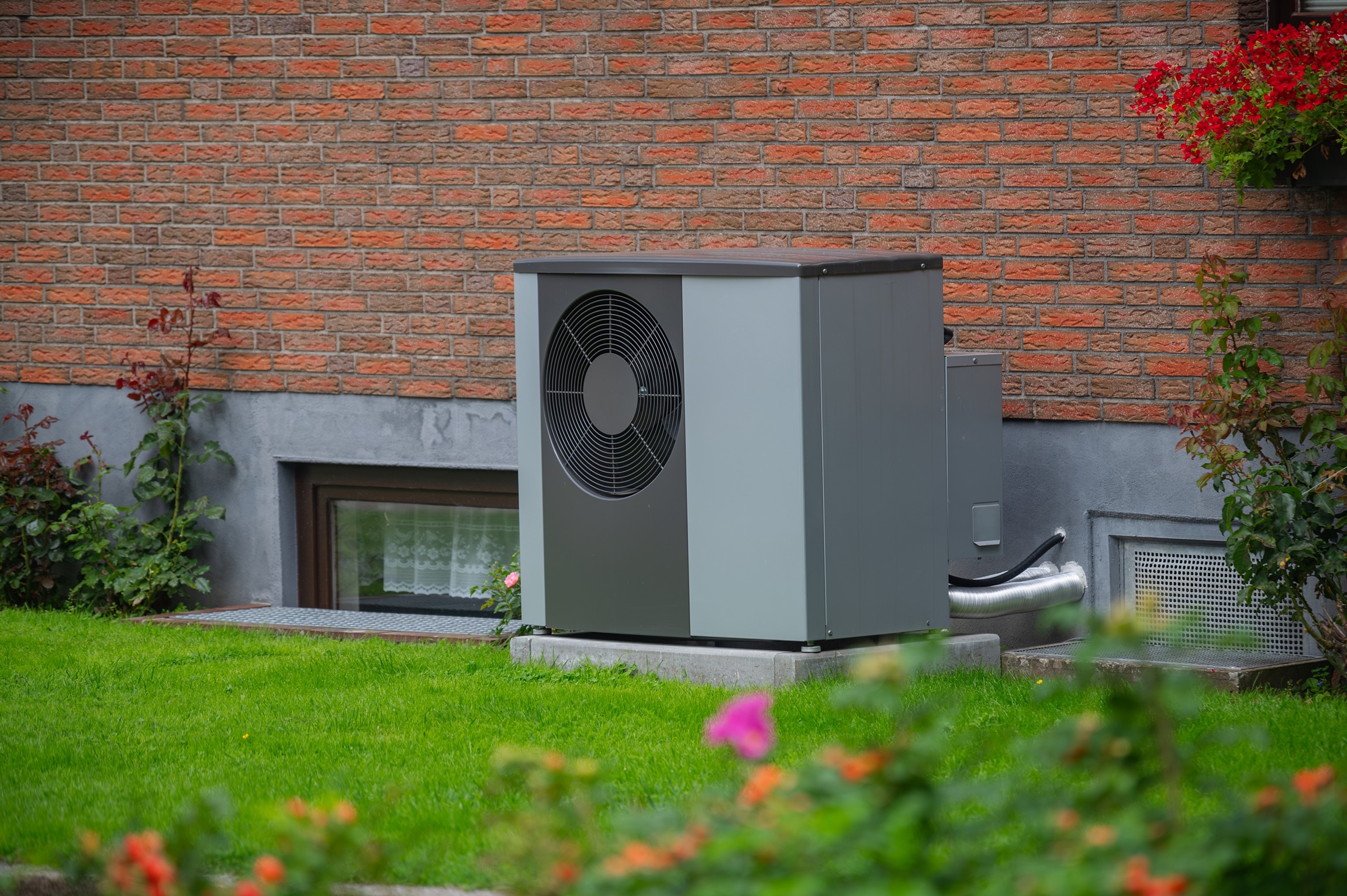 Modern heat pump in garden