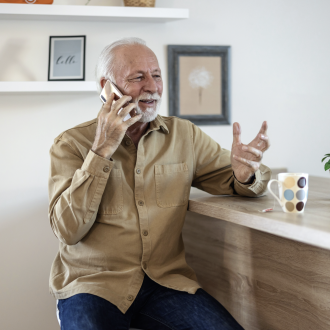 Person on phone in house