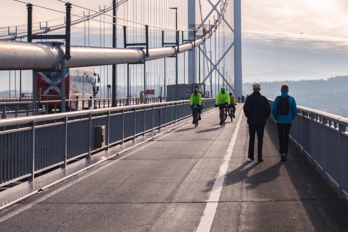 People walking and cycling along the Forth Road bridge