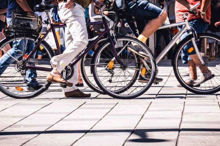 People walking and cycling along a path