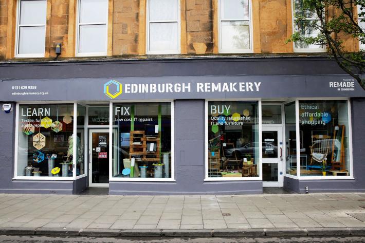 The grey painted exterior of the Remakery shop.