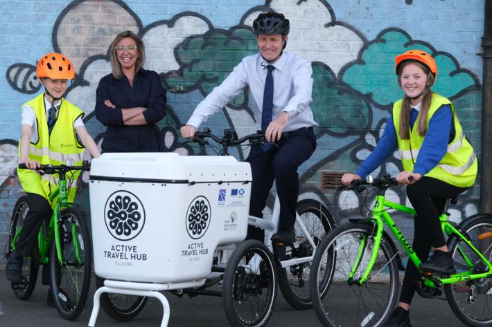 Teachers and school children on bikes