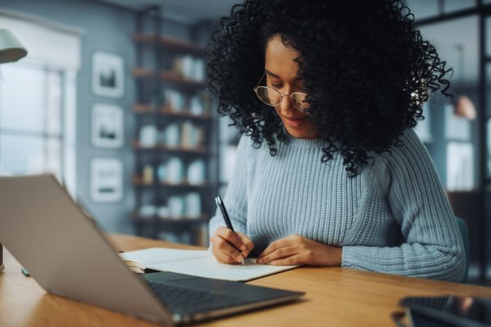 Woman on her laptop working from home
