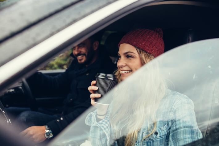 People sharing a car journey