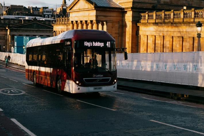 number 41 bus driving on the road