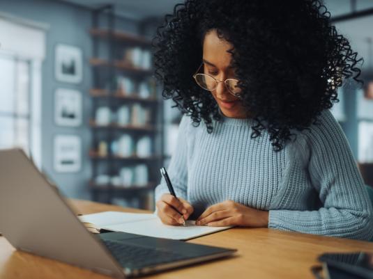 Woman on her laptop working from home