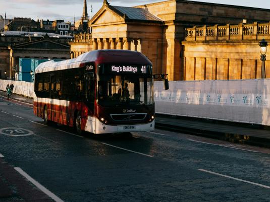 number 41 bus driving on the road